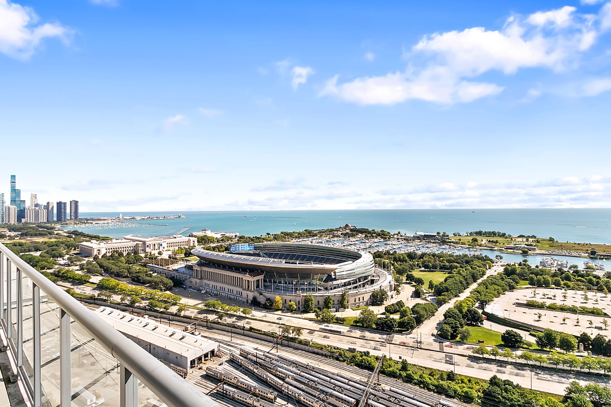 Elevated lakefront view overlooking Soldier Field, the marina, and Lake Michigan